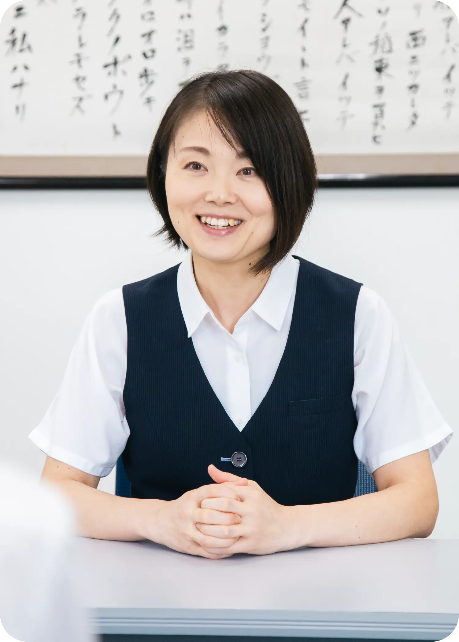 笑顔で談笑する渡部 奈穂子